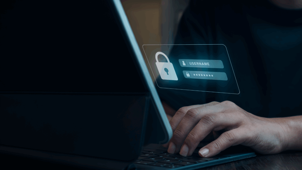 Person typing on laptop with secure login and password protection interface