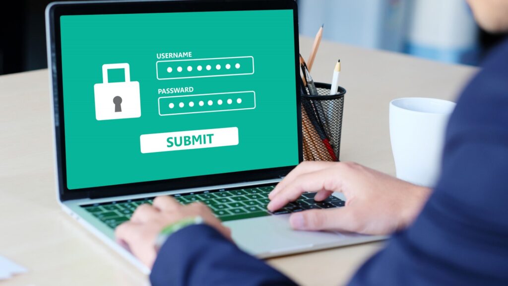 Person signing into an online account using a username and password.