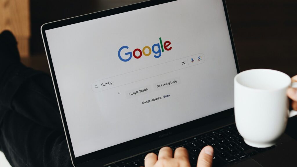 Mac showing Google search results for a download, with “Sponsored” links at the top that can lead to malware 