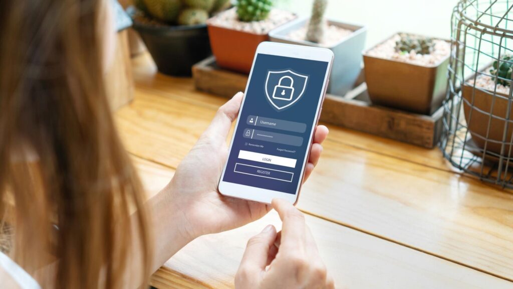 Woman protects her email account with a secure login and two-step verification after a data breach.