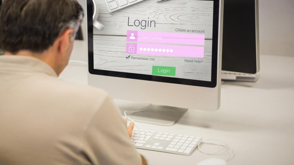 Person at a computer login screen, illustrating how strong passwords and two-step verification can help protect accounts after the 24 billion-record exposure.
