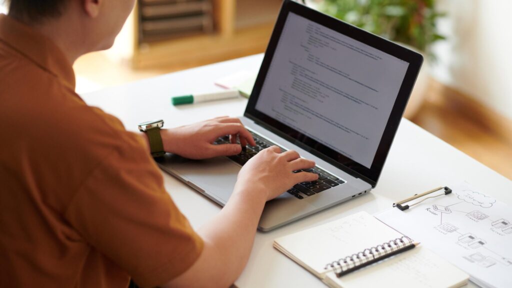 Person reviewing digital documents on a laptop after a law firm data breach