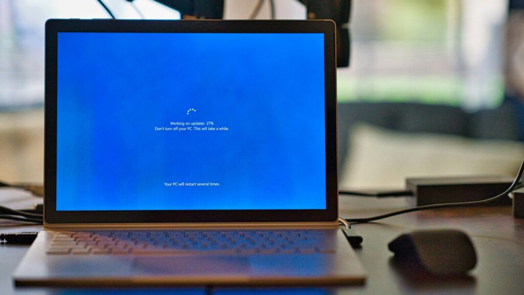 Laptop installing security updates after Oracle PeopleSoft breach news